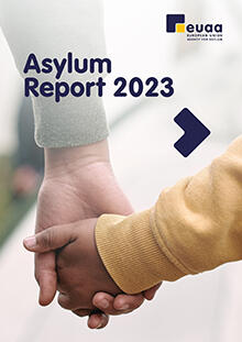 Asylum report 2023 cover page showing two people holding hands 